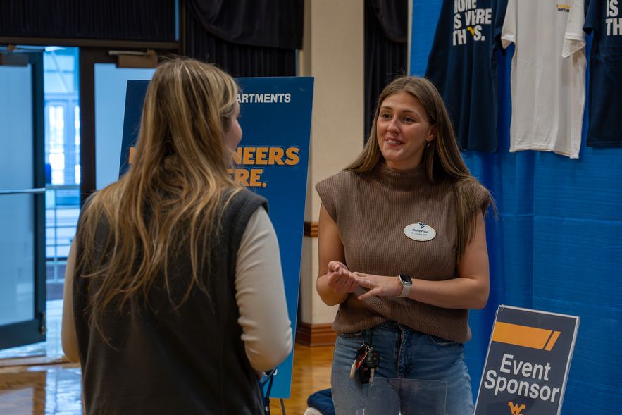 employer talking with a student at the career fair